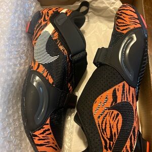 Nike Black and Orange Tiger Print Shoes
